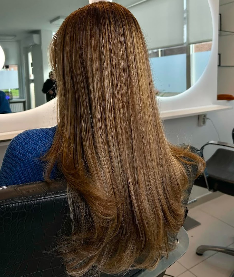 Resultaat: warme honingblonde lengtes bij Kapsalon Chiman
